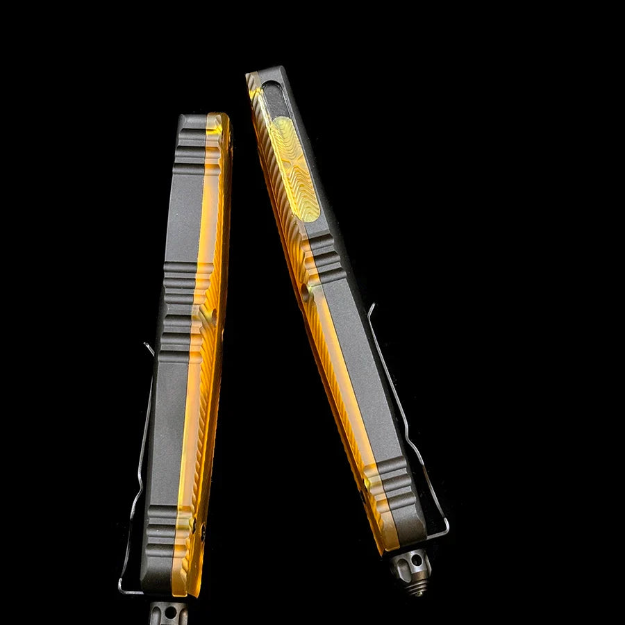 Microtech Combat Troodon D/E Fluted Ultem Signature Series – Transparent Amber Top Handle & Firing Button – Black DLC Premium D2 Double-Edged Tactical OTF Automatic Knife