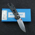 Benchmade BM565-1 Mini Freek: Premium Carbon Fiber Edition